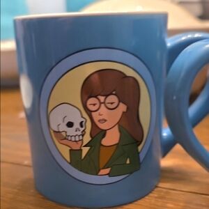 Stylish Blue Mug with Cartoon Design